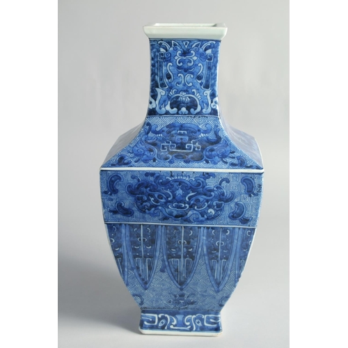 37 - A LARGE CHINESE BLUE AND WHITE PORCELAIN SQUARE FORM VASE, the base with six-character mark, 35cm hi... 