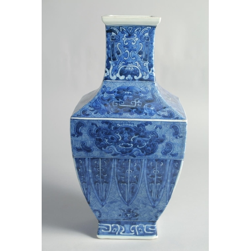 37 - A LARGE CHINESE BLUE AND WHITE PORCELAIN SQUARE FORM VASE, the base with six-character mark, 35cm hi... 