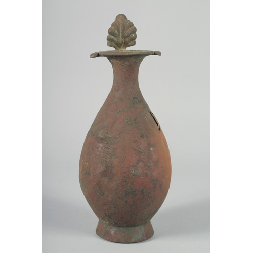 370 - AN EARLY ABBASID OR UMAYYAD EWER, 32.5cm high.