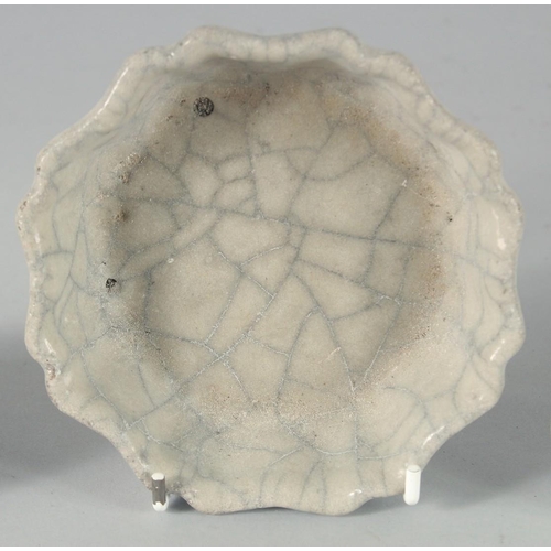 42 - A COLLECTION OF FOUR CHINESE CRACKLE GLAZE ITEMS, comprising a small vase, a bowl, a brush wash and ... 