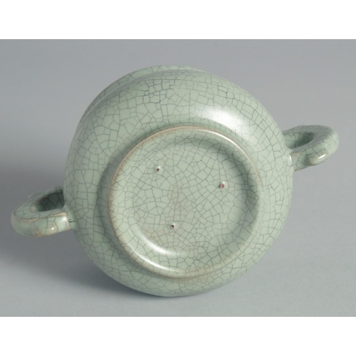 44 - A CHINESE CELADON TWIN HANDLE CENSER, 15cm wide (handle to handle).