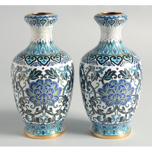 5 - A GOOD PAIR OF BLUE, WHITE AND GREEN CLOISONNE VASES, decorated with intertwined foliate design with... 