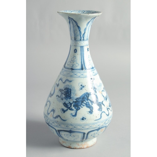 50 - A CHINESE BLUE AND WHITE YUHUCHUN VASE, painted with foo dogs, 30cm high.