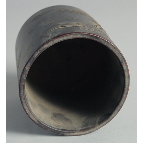 53 - A CHINESE YIXING CYLINDRICAL BRUSH POT, with character mark to base, 11.5cm high