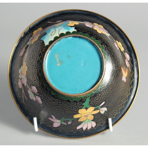 6 - THREE CHINESE CLOISONNE ENAMELLED ITEMS, comprising a black ground bowl, a octagonal brush pot and a... 