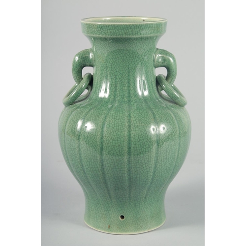 60 - A LARGE CHINESE CELADON CRACKLE GLAZE VASE, with ribbed body and moulded drop ring handles, 30.5cm h... 