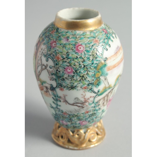 61 - A SMALL CHINESE FAMILLE VERTE PORCELAIN JAR, painted with panels of figures, (lacking lid), 11cm hig... 