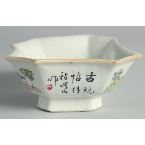 70 - A CHINESE FAMILLE ROSE PORCELAIN OCTAGONAL BOWL, painted with flower pots and inscription.