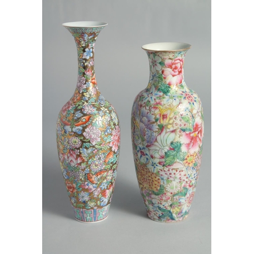 71 - TWO CHINESE FAMILLE ROSE EGGSHELL PORCELAIN VASES, each decorated all over with flowers, (2).