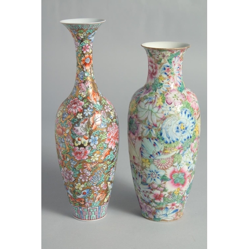 71 - TWO CHINESE FAMILLE ROSE EGGSHELL PORCELAIN VASES, each decorated all over with flowers, (2).