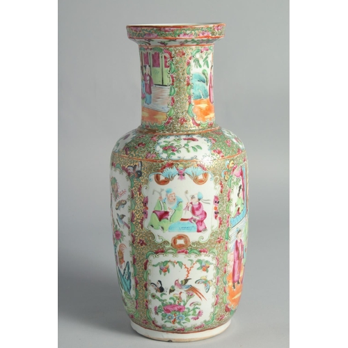 73 - A CHINESE CANTON FAMILLE ROSE PORCELAIN VASE, painted with panels of figures, birds and butterflies,... 