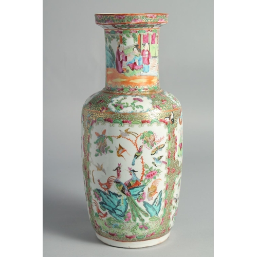 73 - A CHINESE CANTON FAMILLE ROSE PORCELAIN VASE, painted with panels of figures, birds and butterflies,... 