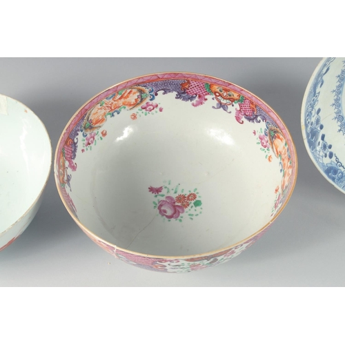 74 - A COLLECTION OF FOUR PORCELAIN ITEMS, including three bowls and a blue and white dish, (af), (4).