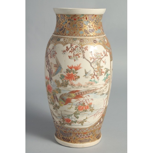 82 - A JAPANESE SATSUMA VASE, painted with two large panels depicting figures as well as birds, butterfli... 