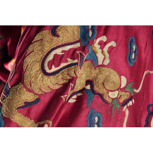 94 - A CHINESE EMBROIDERED SILK JACKET, with embroidered dragons and phoenix.