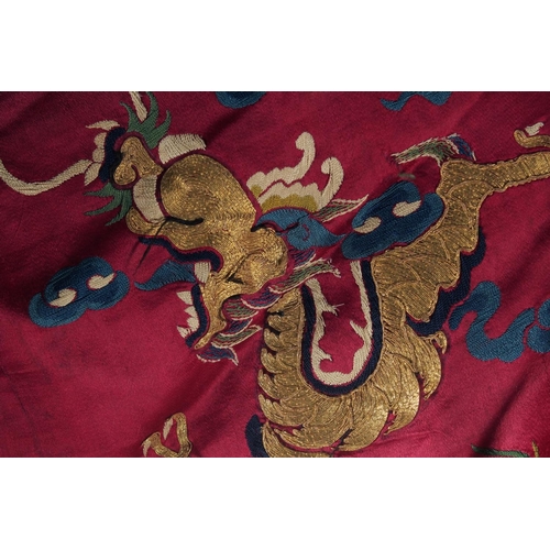 94 - A CHINESE EMBROIDERED SILK JACKET, with embroidered dragons and phoenix.