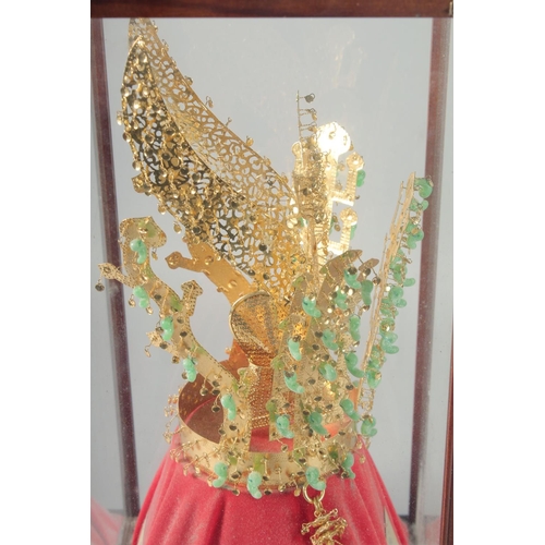 95 - A CHUNMA CHONG GOLD CROWN, no. 188, presented in a glass display case, case 51cm x 23cm x 23cm.