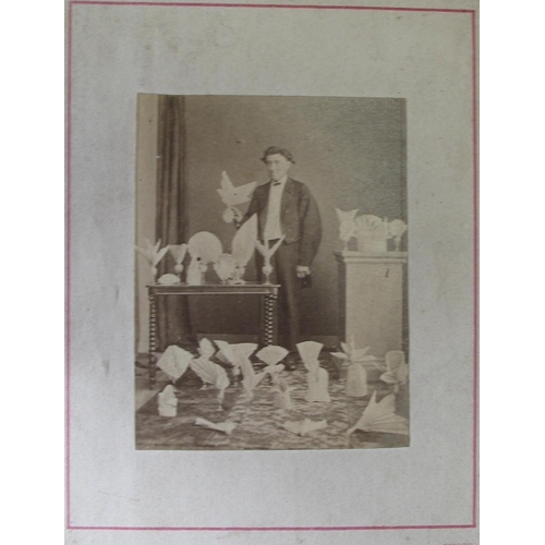 16 - [NAPKIN FOLDING] a small cabinet photograph by W. H. Davis, Wellington, inscribed verso 