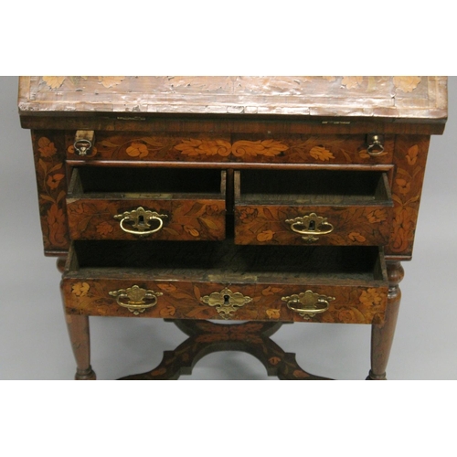 1005 - A GOOD SMALL 18TH CENTURY ENGLISH MARQUETRY BUREAU on a stand with fall front and fitted interior wi... 