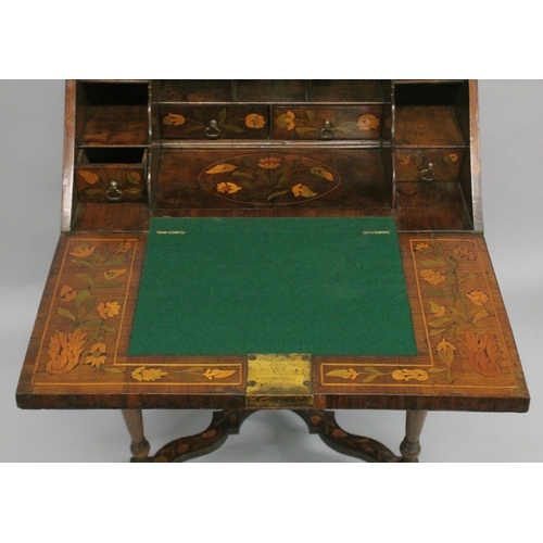 1005 - A GOOD SMALL 18TH CENTURY ENGLISH MARQUETRY BUREAU on a stand with fall front and fitted interior wi... 