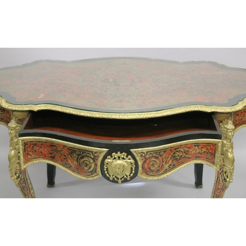 1009 - A SUPERB VICTORIAN BOULLE OVAL CENTRAL TABLE with brass inlay on tortoiseshell, fitted with a long d... 