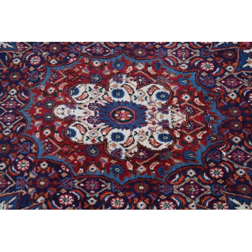 1017 - A GOOD PERSIAN CARPET, cream ground with all over floral decoration.  9'6