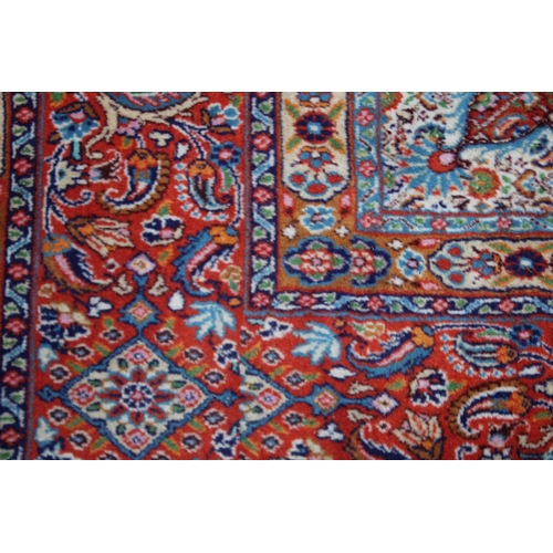 1018 - A GOOD PERSIAN CARPET, cream ground with stylised all over floral decoration.  8' x 6'5