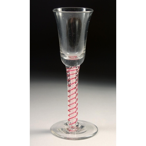 1025 - A DUTCH WINE GLASS with coloured twist stem 5.25ins high.