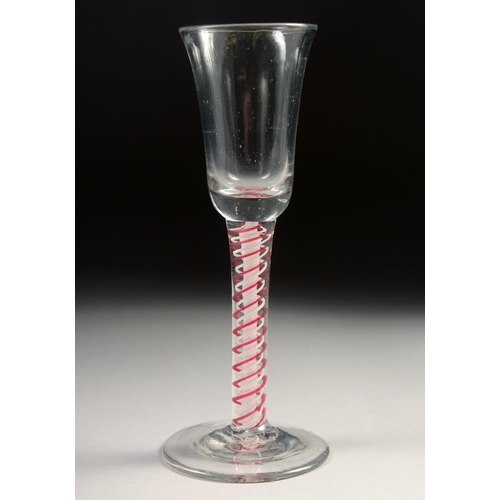 1025 - A DUTCH WINE GLASS with coloured twist stem 5.25ins high.