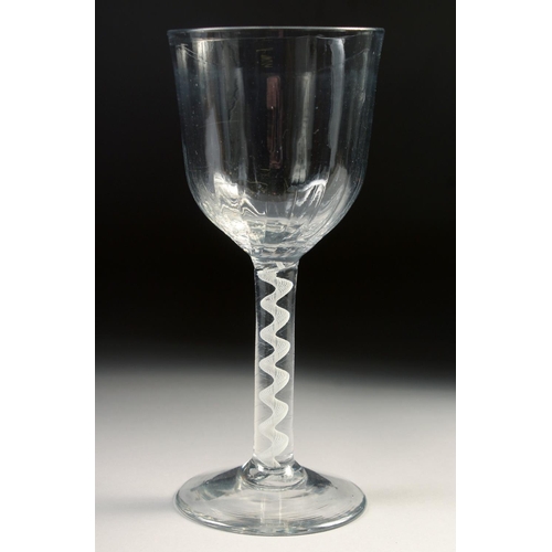 1026 - A LARGE 18TH CENTURY WINE GLASS with air twist stem. 7.25ins high.