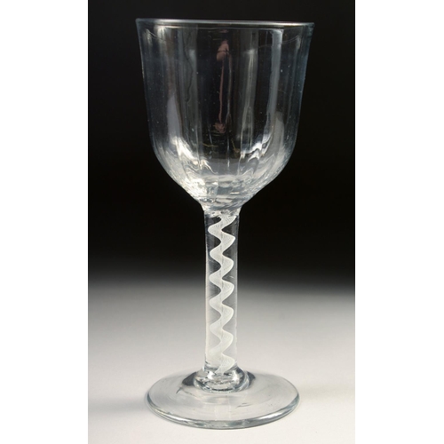 1026 - A LARGE 18TH CENTURY WINE GLASS with air twist stem. 7.25ins high.