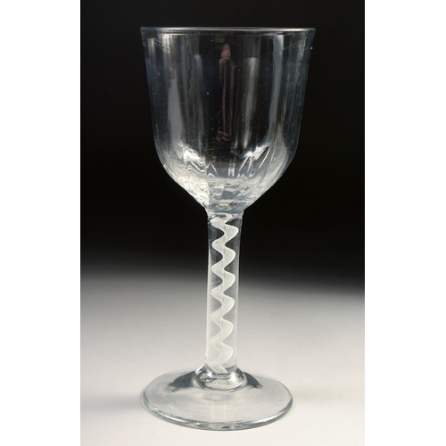 1026 - A LARGE 18TH CENTURY WINE GLASS with air twist stem. 7.25ins high.