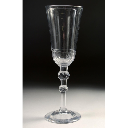 1027 - A LARGE 18TH CENTURY WINE GLASS with air twist stem. 7.25ins high.