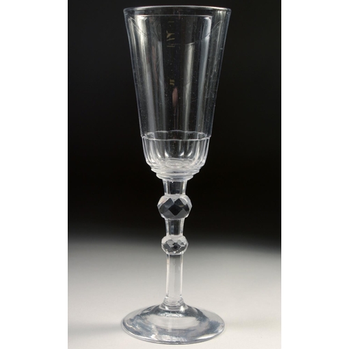 1027 - A LARGE 18TH CENTURY WINE GLASS with air twist stem. 7.25ins high.