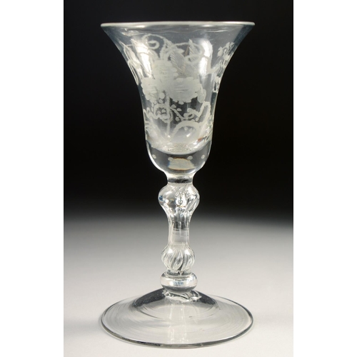 1028 - AN 18TH CENTURY WINE GLASS with inverted bell bowl, engraved with vines. 6ins high.