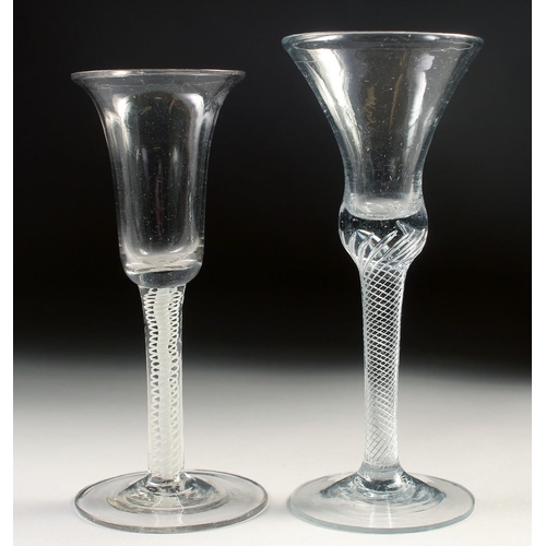 1034 - TWO 18TH CENTURY DUTCH WINE GLASSES. 6.75ins and 6.25ins high.