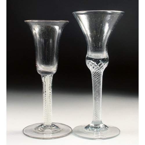 1034 - TWO 18TH CENTURY DUTCH WINE GLASSES. 6.75ins and 6.25ins high.