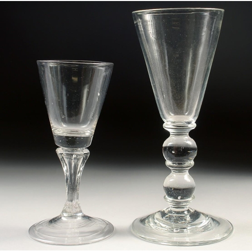 1037 - A HEAVY GLASS WINE GLASS with double knop stem and a small Dutch glass (2). 5.25ins high.