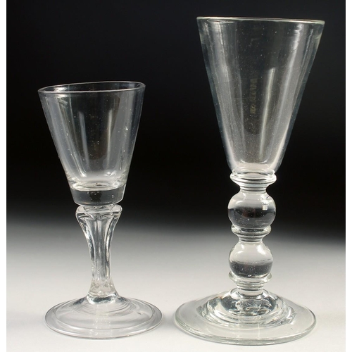 1037 - A HEAVY GLASS WINE GLASS with double knop stem and a small Dutch glass (2). 5.25ins high.