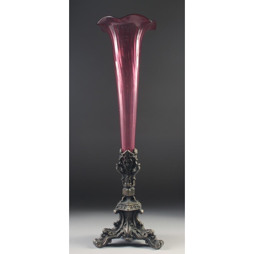 1040 - A 19TH CENTURY TALL TAPERING GLASS CENTREPIECE with cast metal base. 24ins high.