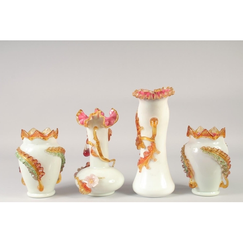 1041 - A SUPERB 19TH CENTURY FRENCH OPALINE SUITE OF FOUR VASES decorated in relief with fruit. 11ins, 9.5i... 