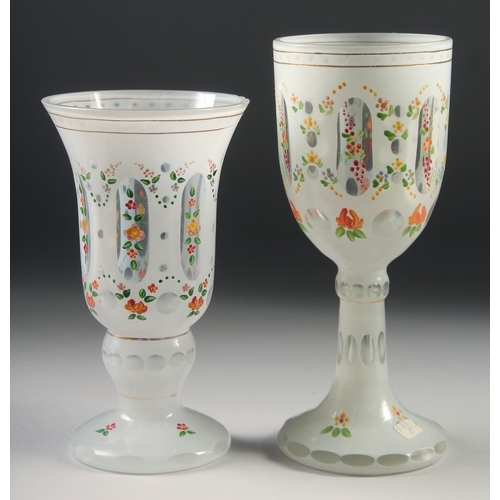 1045 - TWO BOHEMIAN GLASS GOBLETS painted with flowers. 8ins & 7ins high.