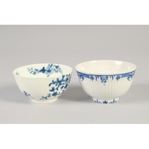 1063 - AN 18TH CENTURY WORCESTER TEA BOWL AND SAUCER painted with Prunus Root and a ribbed tea bowl and sau... 