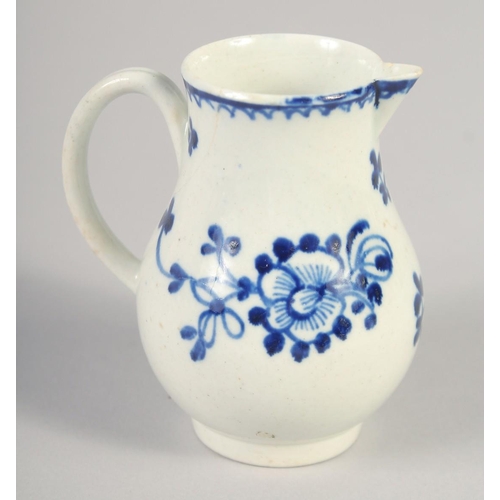 1068 - AN 18TH CENTURY LIVERPOOL JUG painted in underglaze blue with flowers with external line and loop bo... 