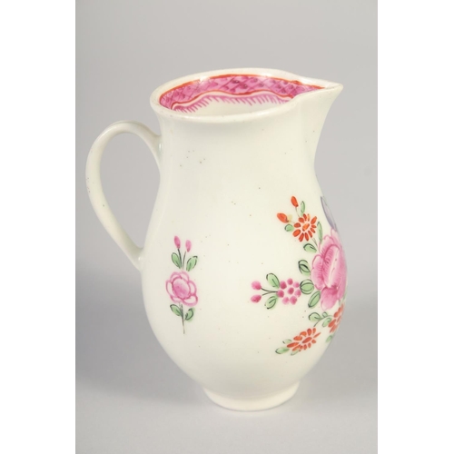 1070 - AN 18TH CENTURY WORCESTER JUG painted with flowers and an internal pink diaper border.