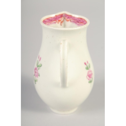 1070 - AN 18TH CENTURY WORCESTER JUG painted with flowers and an internal pink diaper border.