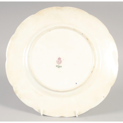 1081 - A ROYAL WORCESTER SUPERB PLATE painted with an English cottage having a floriferous garden ,the scen... 