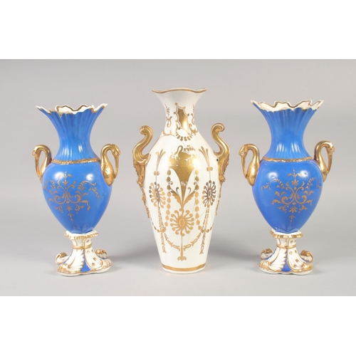 1087 - A 19TH CENTURY ROCKINGHAM PAIR OF VASES with bird head handles painted with flowers in panels on a b... 