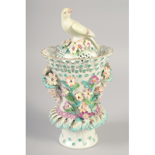 1088 - AN 18TH OR 19TH CENTURY VASE AND COVER with bird finial encrusted with flowers and face-mask handles... 