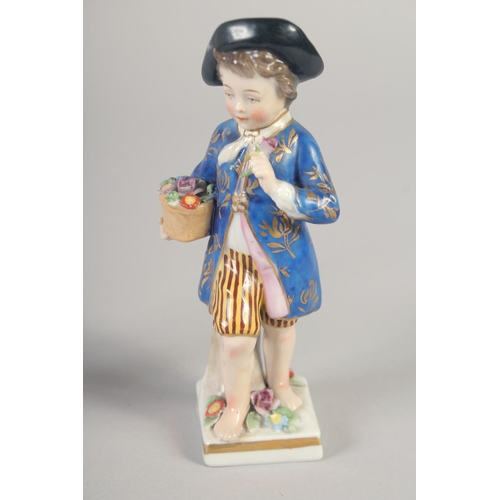 1095 - A 19TH CENTURY STAFFORDSHIRE PORCELAIN FIGURE OF A GIRL wearing a hat. and A PAIR OF CONTINENTAL FIG... 